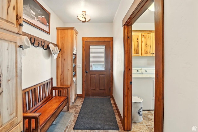 3703 W 600 S, Logan, UT 84321 - mudroom with separate washer and dryer, light stone finish flooring, and baseboards