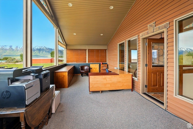 3703 W 600 S, Logan, UT 84321 - sunroom featuring carpet floors, vaulted ceiling, wooden walls, a mountain view, and recessed lighting