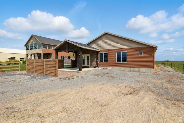 3703 W 600 S, Logan, UT 84321 - view of front of house featuring fence and french doors