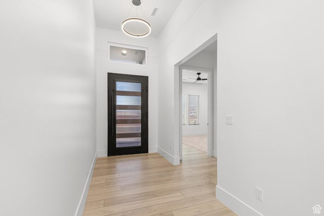 147 E Terrace Ln, Ivins, UT 84738 - foyer entrance with light wood-type flooring, baseboards, and a ceiling fan