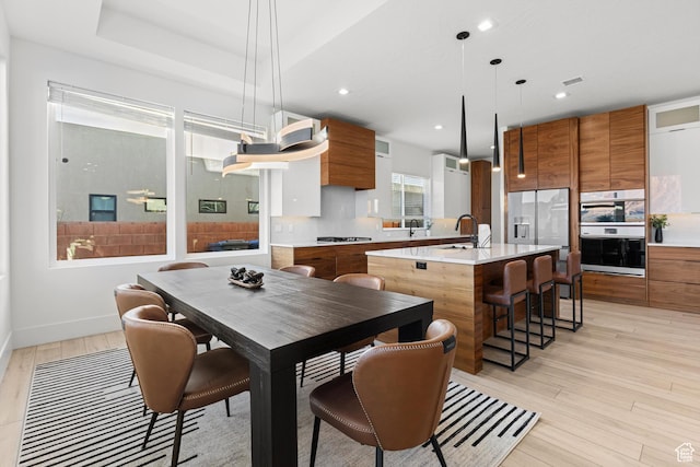 147 E Terrace Ln, Ivins, UT 84738 - dining area featuring light wood-style floors, recessed lighting, and baseboards