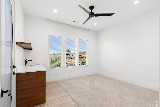 147 E Terrace Ln, Ivins, UT 84738 - bathroom featuring ceiling fan, a sink, baseboards, recessed lighting, and wood finished floors