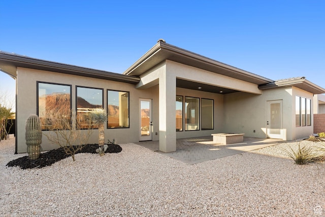 147 E Terrace Ln, Ivins, UT 84738 - rear view of house featuring a patio area and stucco siding