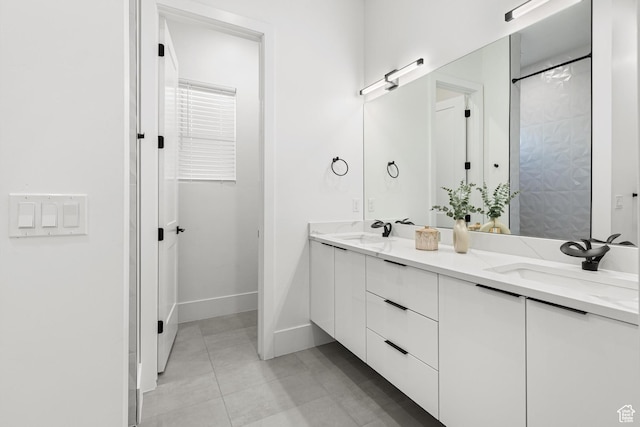 147 E Terrace Ln, Ivins, UT 84738 - full bath with double vanity, tile patterned floors, and baseboards