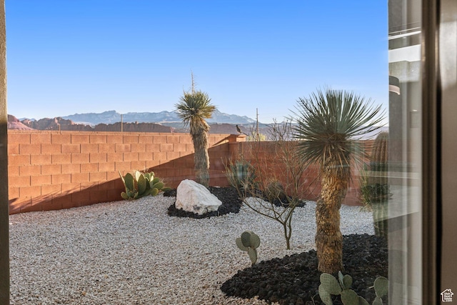 147 E Terrace Ln, Ivins, UT 84738 - fenced backyard featuring a mountain view