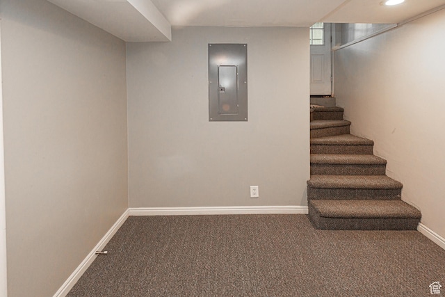 2848 S 500 E, South Salt Lake, UT 84106 - finished below grade area featuring electric panel, carpet, baseboards, and stairs