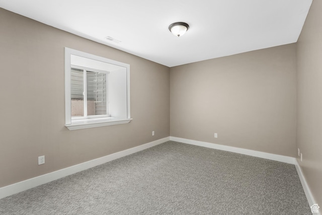 225 S 900 E, Salt Lake City, UT 84102 - carpeted empty room featuring baseboards