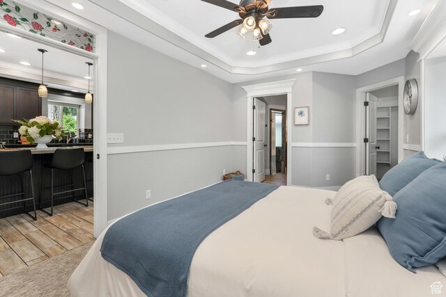 225 S 900 E, Salt Lake City, UT 84102 - bedroom featuring recessed lighting, light wood finished floors, crown molding, a tray ceiling, and ceiling fan