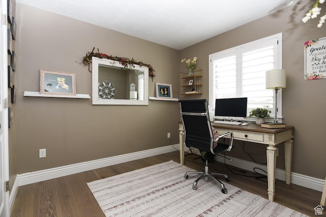 office featuring wood finished floors and baseboards