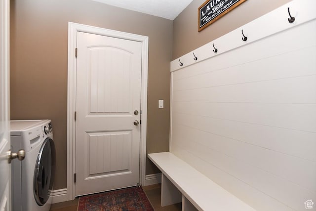 mudroom featuring washer / dryer and baseboards