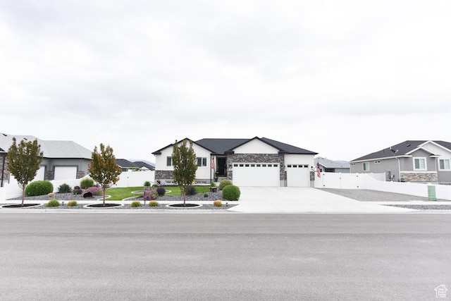 ranch-style house featuring a garage, a residential view, fence, and driveway