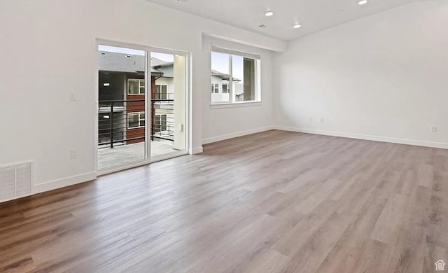 473 W 40 S Unit H 204, Providence, UT 84332 - empty room featuring wood finished floors, baseboards, and recessed lighting