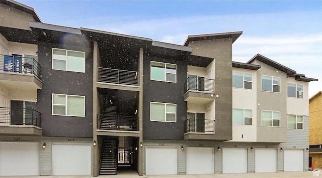 473 W 40 S Unit H 204, Providence, UT 84332 - view of building exterior with a garage