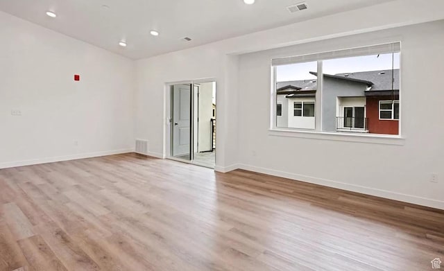 473 W 40 S Unit H 204, Providence, UT 84332 - unfurnished room with wood finished floors, baseboards, and recessed lighting