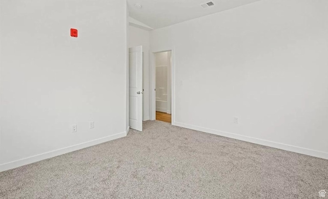 473 W 40 S Unit H 204, Providence, UT 84332 - unfurnished room featuring carpet flooring, baseboards, and vaulted ceiling