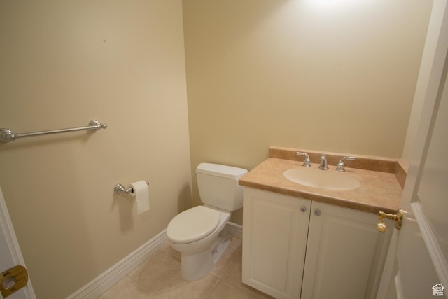 1315 E 1550 N, North Logan, UT 84341 - bathroom featuring vanity, toilet, tile patterned flooring, and baseboards