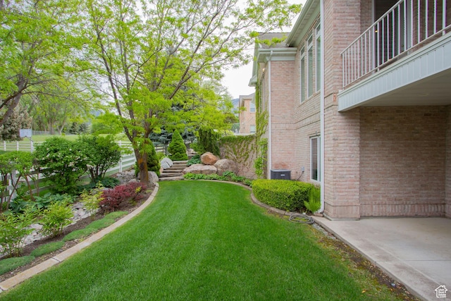 1315 E 1550 N, North Logan, UT 84341 - view of green lawn featuring central AC unit and a balcony