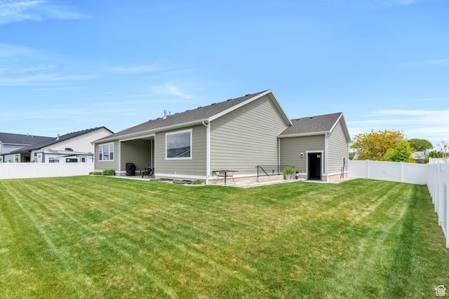 701 S Crooket Post Way W, Saratoga Springs, UT 84045 - back of house with a patio area and a shingled roof