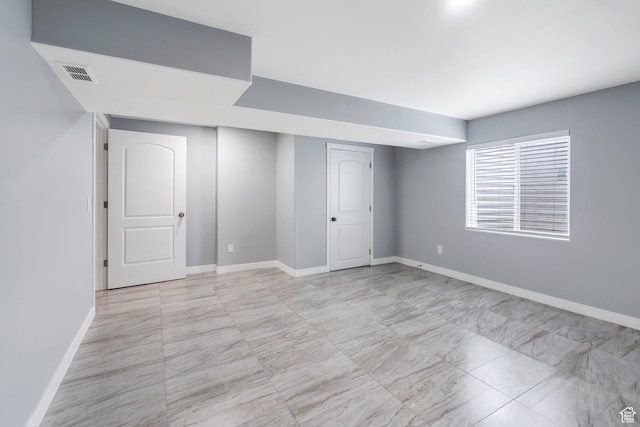 701 S Crooket Post Way W, Saratoga Springs, UT 84045 - below grade area with baseboards and light marble finish flooring