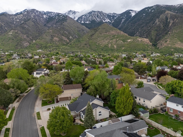 aerial view of residential area with a mountain backdrop