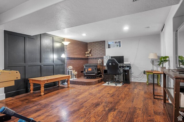 1414 N 325 E, Bountiful, UT 84010 - office area with wood finished floors, a wood stove, a textured ceiling, and recessed lighting