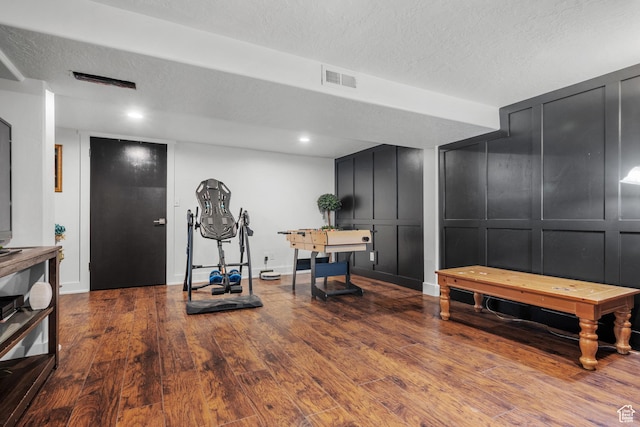 1414 N 325 E, Bountiful, UT 84010 - exercise area with a decorative wall, wood finished floors, a textured ceiling, and baseboards