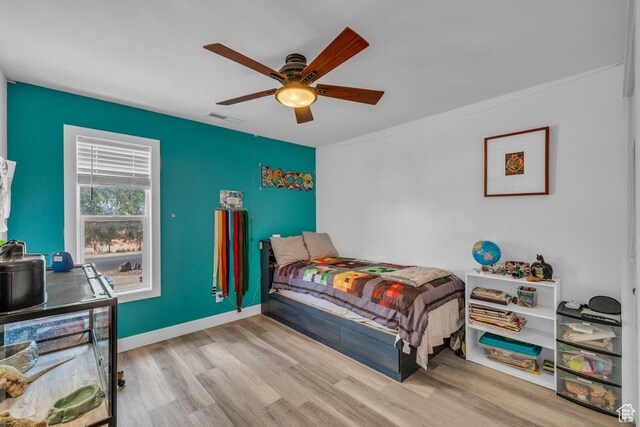 851 E Posado St, Ivins, UT 84738 - bedroom with wood finished floors, a ceiling fan, baseboards, and crown molding