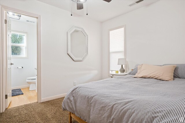 851 E Posado St, Ivins, UT 84738 - bedroom with carpet flooring, baseboards, ensuite bathroom, and ceiling fan