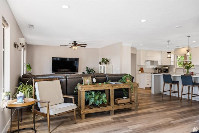 851 E Posado St, Ivins, UT 84738 - living area with a ceiling fan, light wood finished floors, and recessed lighting