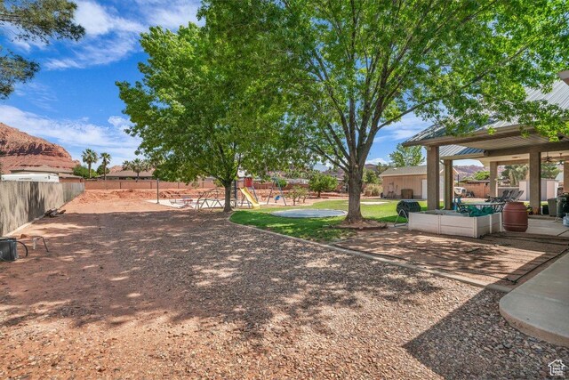851 E Posado St, Ivins, UT 84738 - view of yard with a playground, fence, and a gazebo