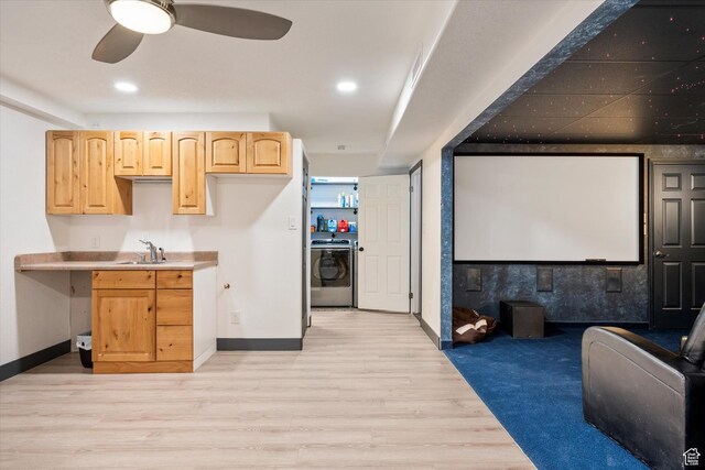 851 E Posado St, Ivins, UT 84738 - kitchen featuring washer / dryer, a sink, light wood-type flooring, light brown cabinets, and baseboards