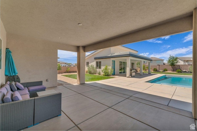 2938 S Poplar Ln, St George, UT 84790 - view of patio featuring outdoor lounge area and a fenced backyard