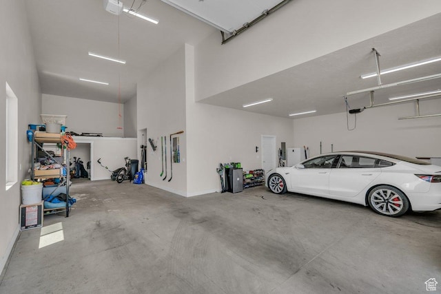 2938 S Poplar Ln, St George, UT 84790 - garage featuring a garage door opener
