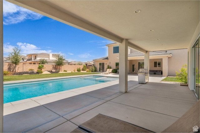 2938 S Poplar Ln, St George, UT 84790 - view of pool with a patio, fence, and grilling area