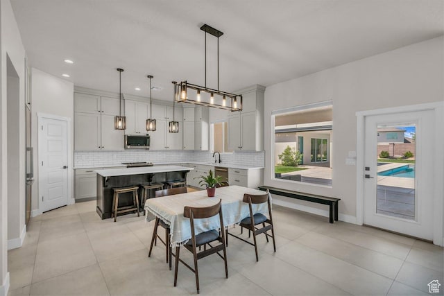 2938 S Poplar Ln, St George, UT 84790 - dining area featuring recessed lighting, baseboards, and light tile patterned floors