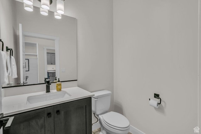 2938 S Poplar Ln, St George, UT 84790 - bathroom featuring toilet and vanity