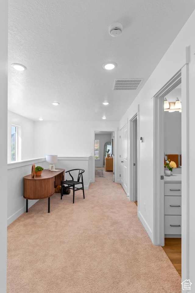 247 W 925 N Unit I49, Brigham City, UT 84302 - hall featuring baseboards, carpet floors, plenty of natural light, and recessed lighting