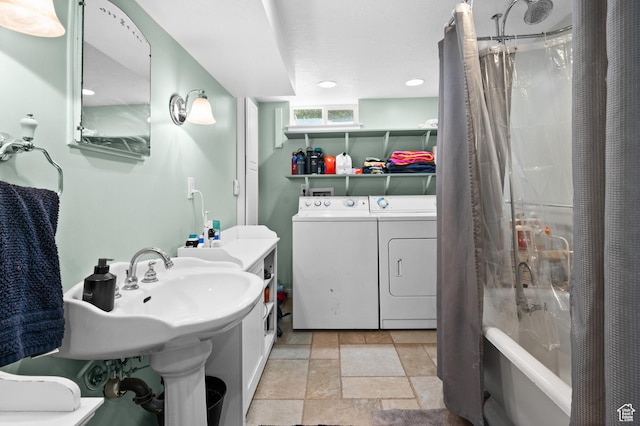 bathroom with washer and dryer, stone finish flooring, shower / bathtub combination with curtain, and recessed lighting