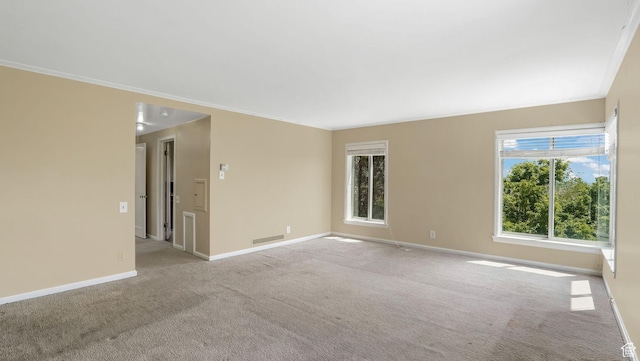 255 N A St E, Salt Lake City, UT 84103 - unfurnished room with healthy amount of natural light, carpet flooring, and baseboards