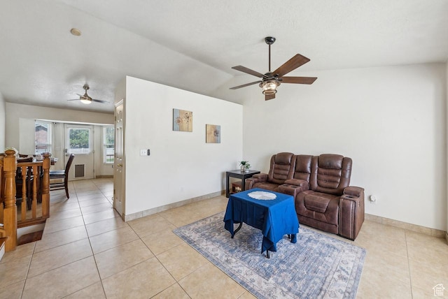 1447 E 230 S, Spanish Fork, UT 84660 - living room with a ceiling fan, light tile patterned floors, lofted ceiling, and baseboards