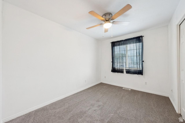 1447 E 230 S, Spanish Fork, UT 84660 - spare room with dark carpet, ceiling fan, and baseboards