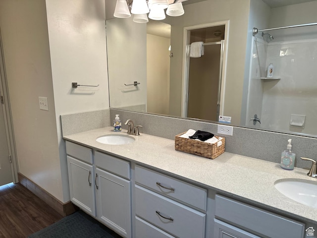 2500 N Bear Lake Blvd, Garden City, UT 84028 - bathroom featuring an enclosed shower, wood finished floors, and double vanity