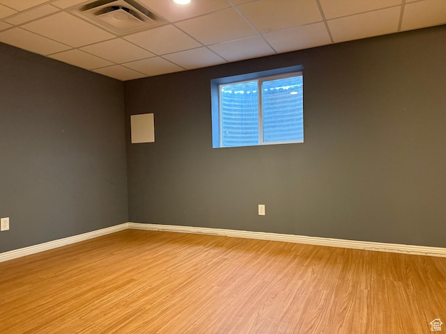 6351 S Moki Cir W, West Jordan, UT 84081 - unfurnished room featuring a paneled ceiling, wood finished floors, and baseboards