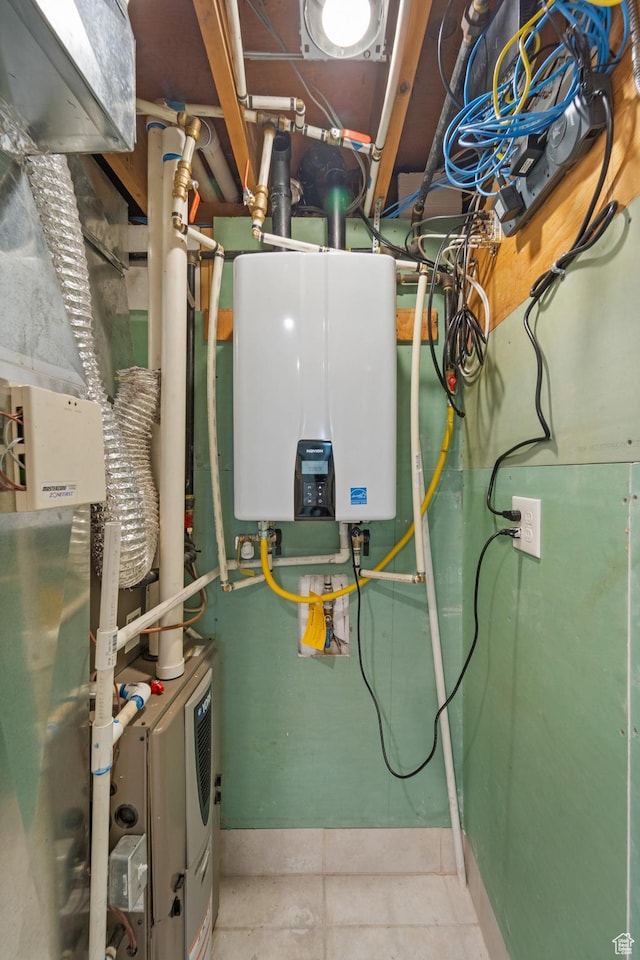 utility room featuring water heater