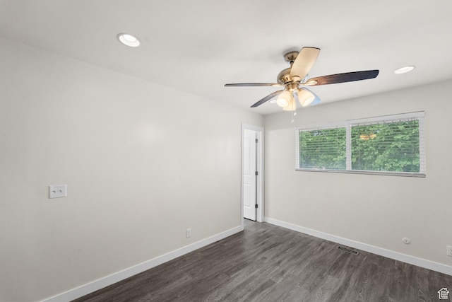 empty room featuring dark wood finished floors, ceiling fan, baseboards, and recessed lighting