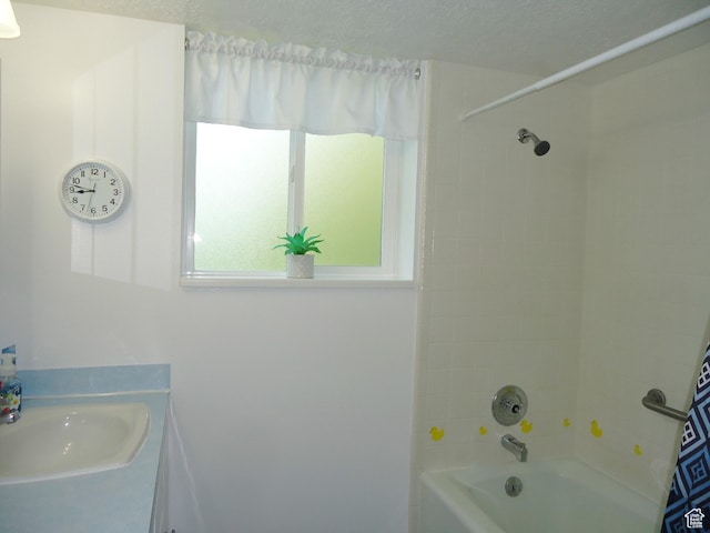 full bathroom featuring shower / tub combination and vanity