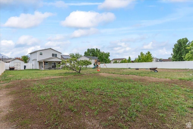 view of yard featuring a playground