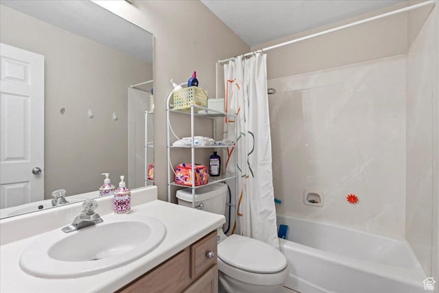 bathroom featuring toilet, shower / bath combo with shower curtain, and vanity