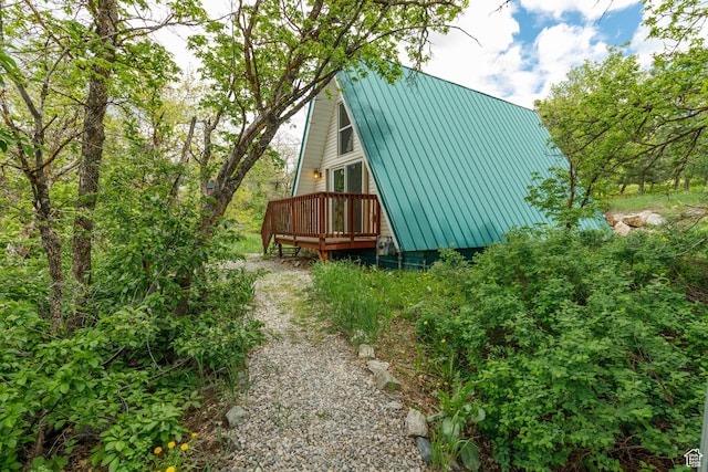 2147 N 3850 E, Eden, UT 84310 - view of side of property featuring a wooden deck and metal roof