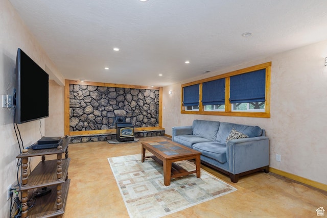 2147 N 3850 E, Eden, UT 84310 - living area with a wood stove, recessed lighting, and baseboards